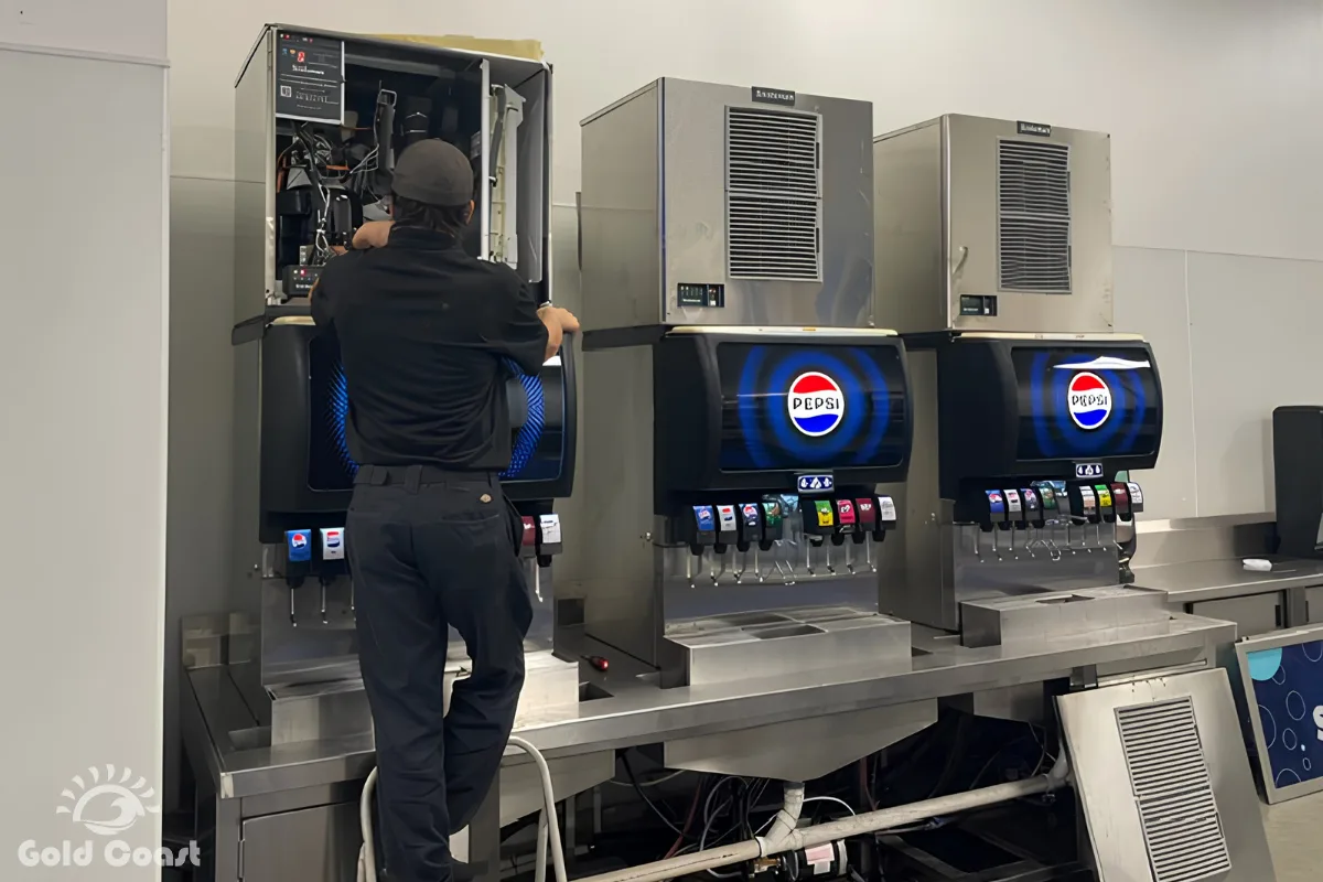 Gold Coast technician inspecting a commercial ice machine with low ice production