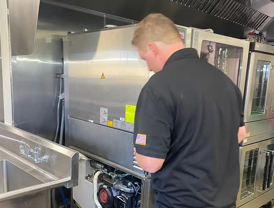 Refrigeration technician at work